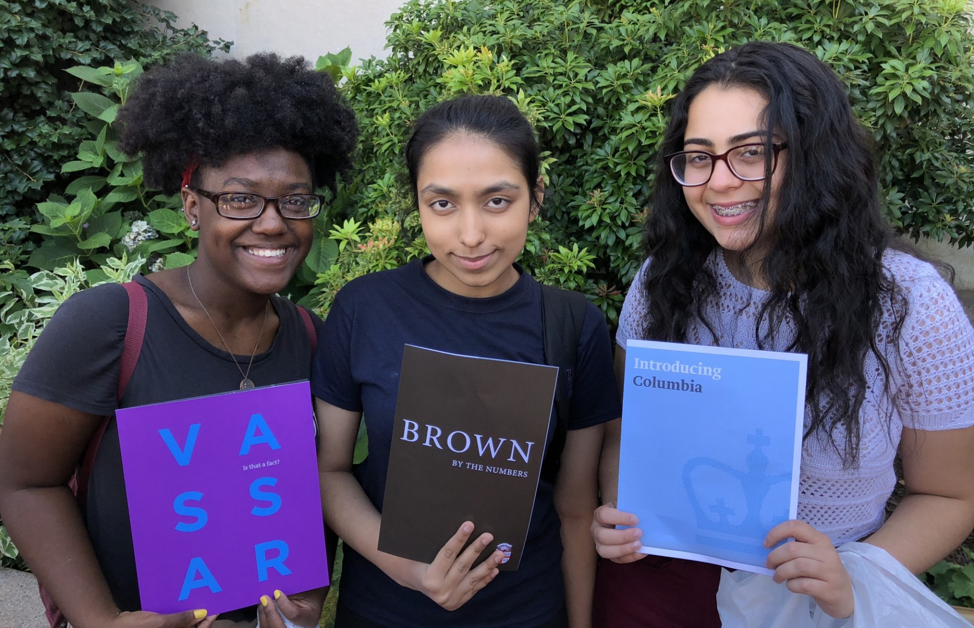 Students with college posters