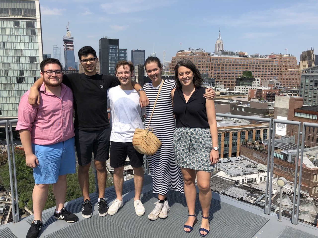 jon carlo and other staff on the roof of the whitney
