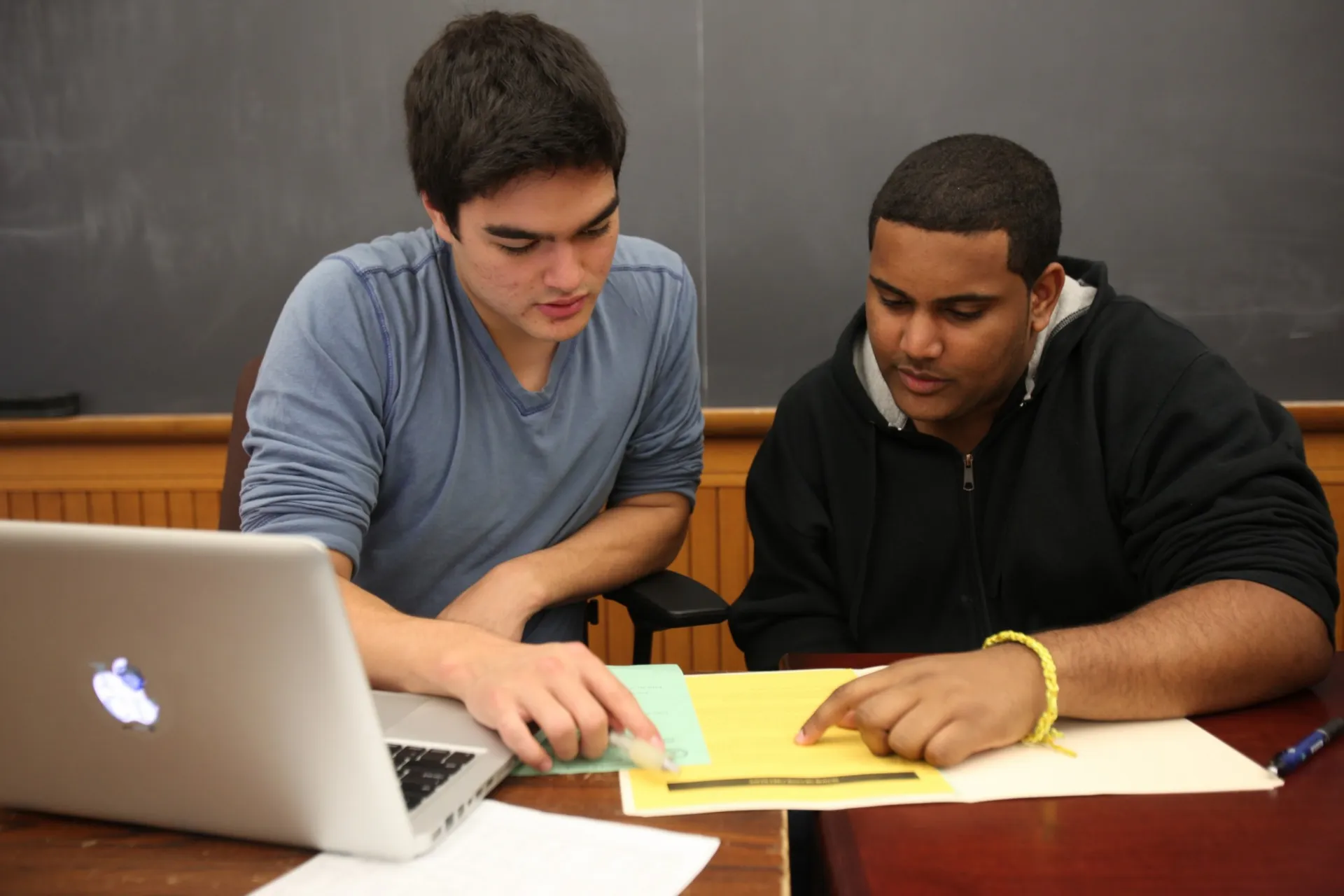 students working on texts