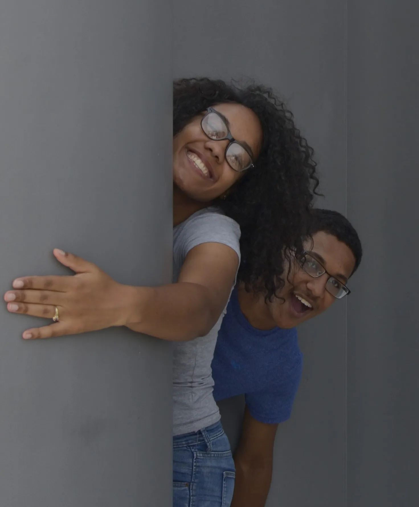 Two students smiling