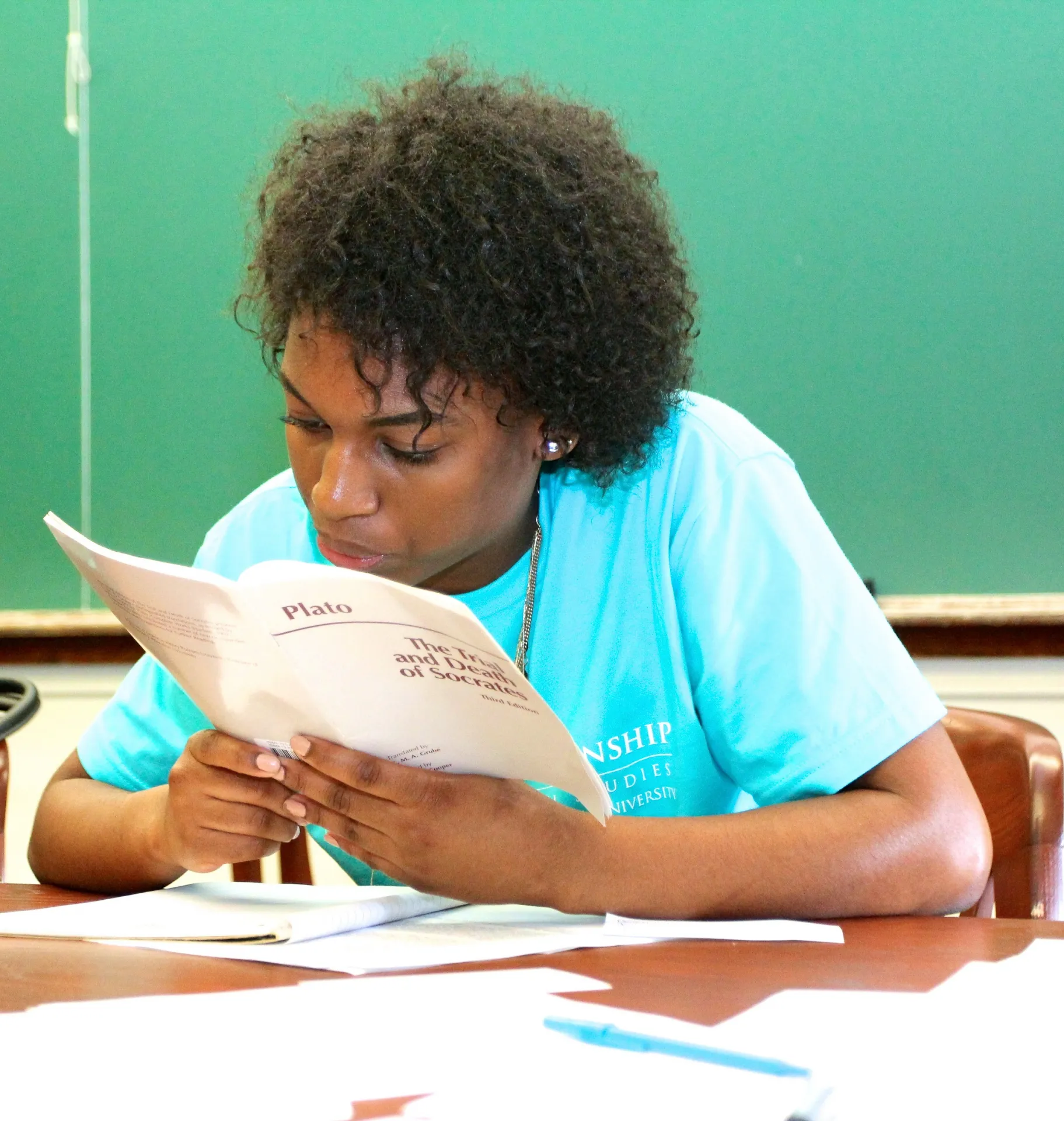 Student reading Plato