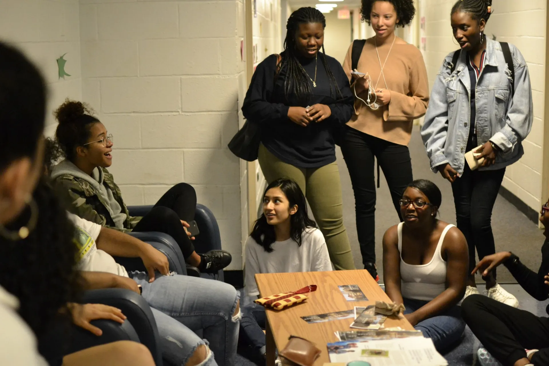 Students relaxing in dorm