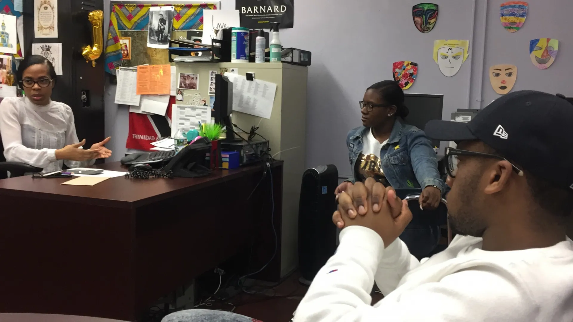 Students sitting, talking with Jamali Moses